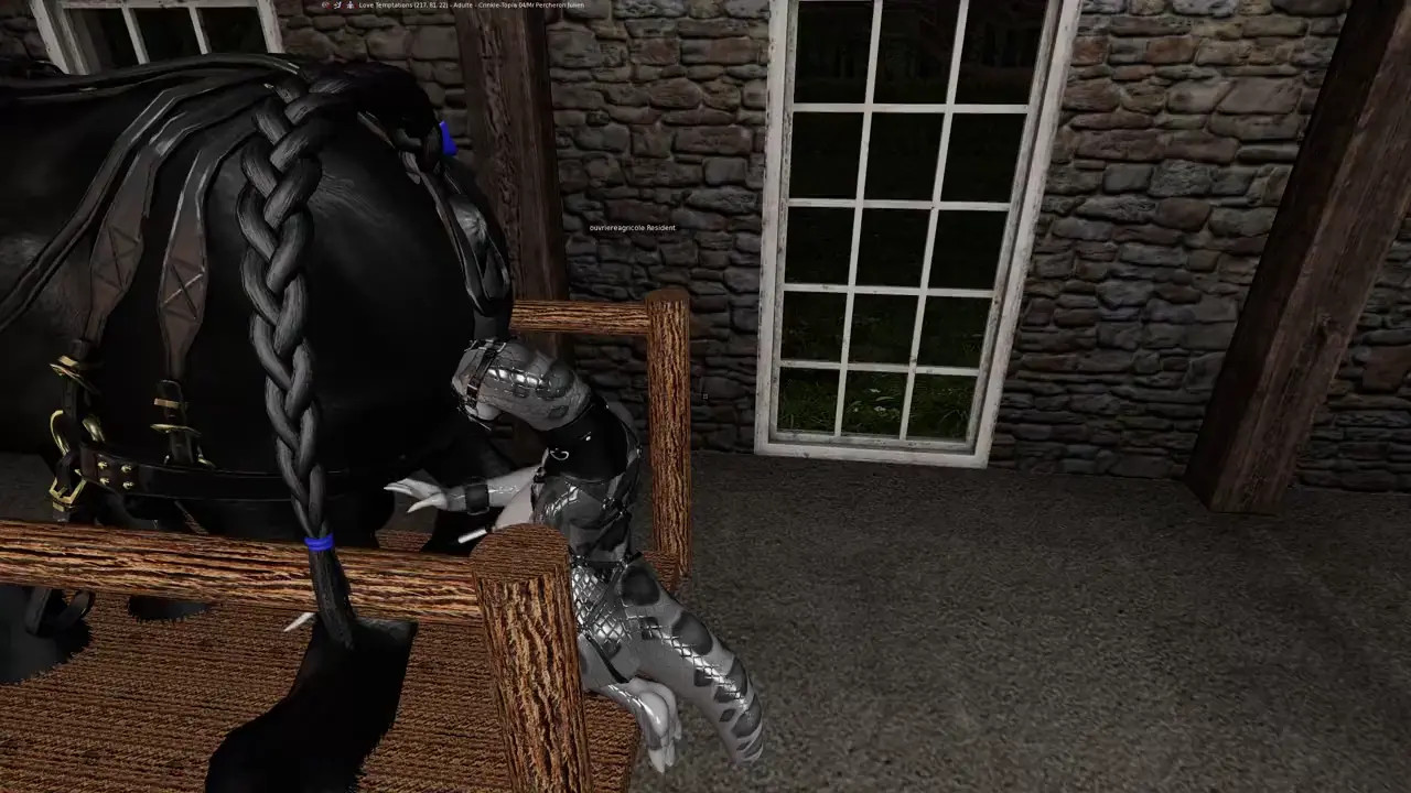 A Percheron stallion is being tortured. His testicles are being tortured by a furry f